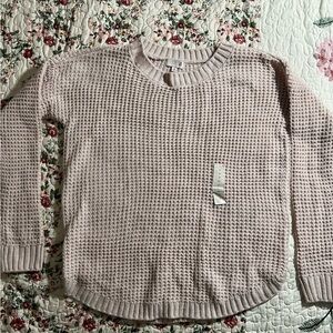 Pink sweater knitted